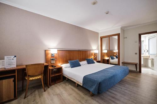 Habitación Doble Económica del hotel Ciudad de Compostela. Foto 2
