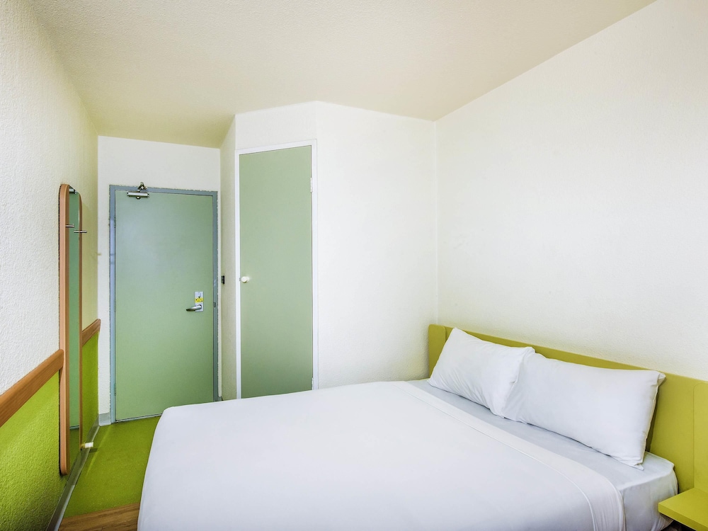 Habitación Estándar con 1 Cama Queen Size del hotel Ibis Budget Fawkner. Foto 1