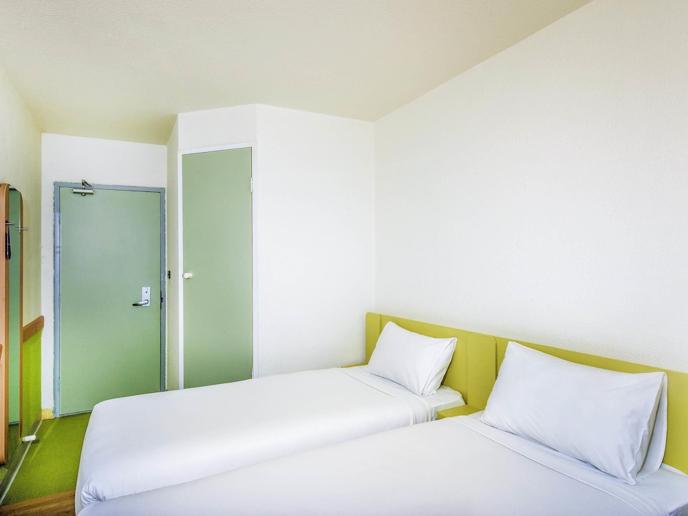 Habitación estándar con 2 camas individuales del hotel Ibis Budget Fawkner. Foto 1