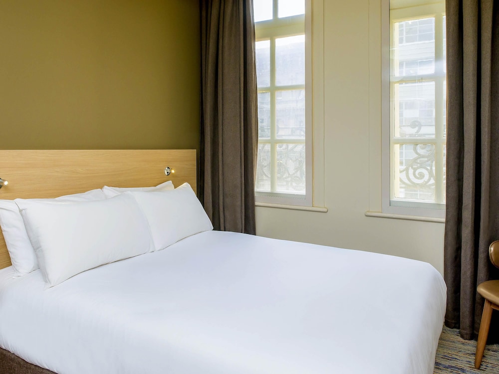 Habitación Estándar con cama Queen del hotel Ibis Budget Melbourne Cbd. Foto 6