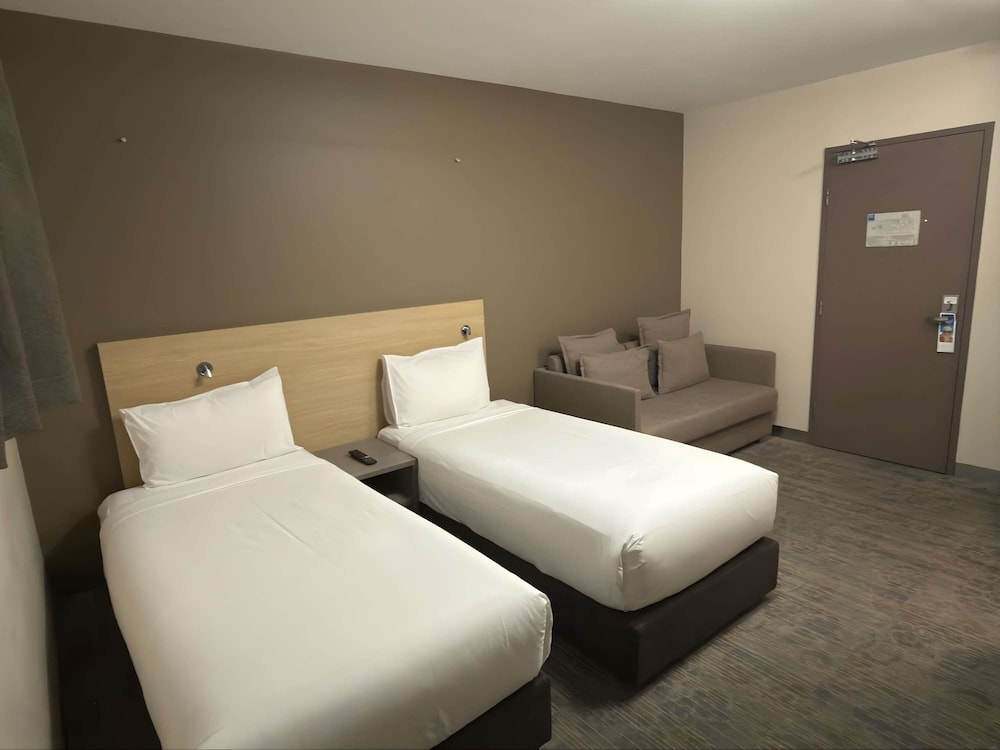 Habitación estándar con dos camas individuales del hotel Ibis Budget Melbourne Cbd