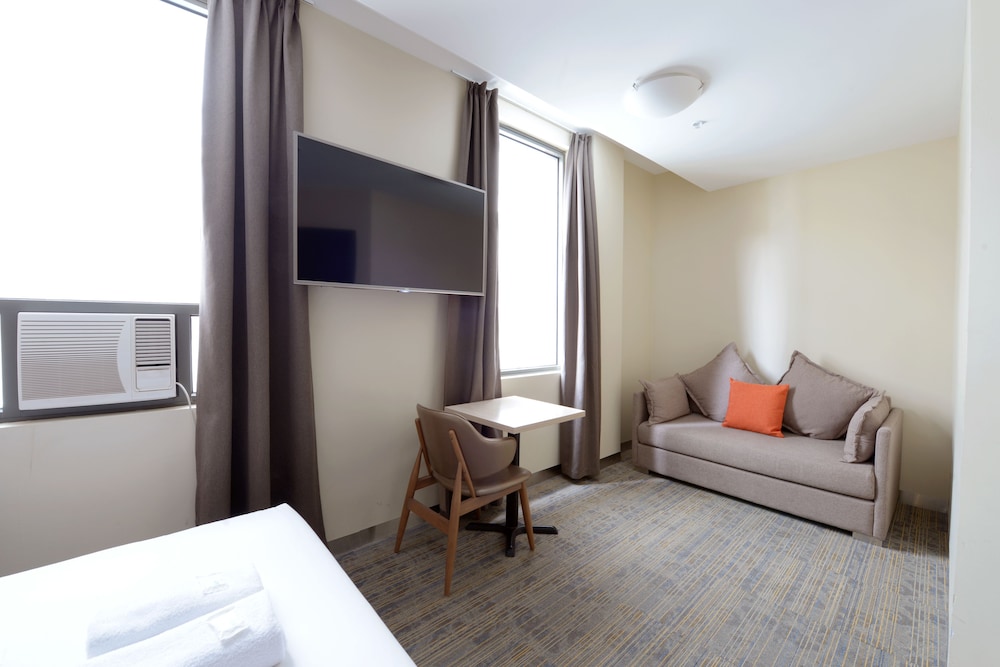 Habitación Doble con Dos Camas Dobles, Accesible para Sillas de Ruedas del hotel Ibis Budget Melbourne Cbd. Foto 2