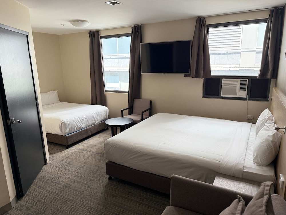 Habitación Doble con Dos Camas Dobles, Accesible para Sillas de Ruedas del hotel Ibis Budget Melbourne Cbd. Foto 4