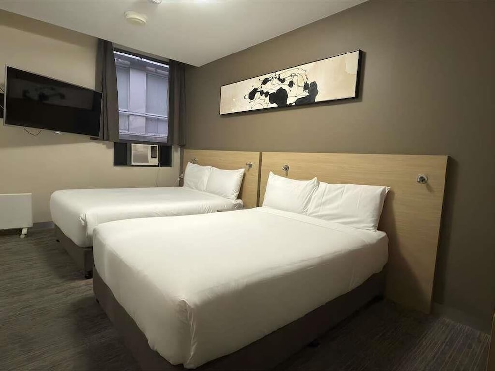 Habitación Doble con Dos Camas Dobles, Accesible para Sillas de Ruedas del hotel Ibis Budget Melbourne Cbd. Foto 6