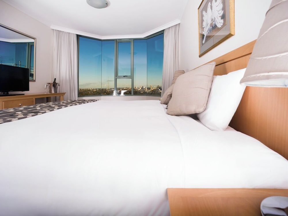 Apartamento de 3 dormitorios con 1 cama king, 1 cama queen y 2 camas individuales del hotel The Sebel Sydney Chatswood. Foto 4