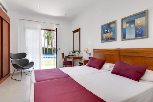 Habitación Doble con acceso al jardín - 1 o 2 camas del hotel Daniya Denia. Foto 2