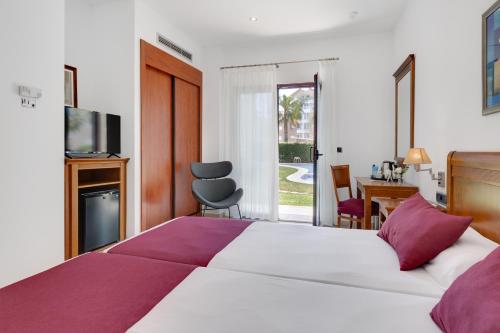 Habitación Doble con acceso al jardín - 1 o 2 camas del hotel Daniya Denia. Foto 3