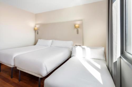 Habitación Triple del hotel B&B Elche. Foto 2