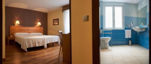 Habitación Triple Estándar del hotel 40 Nudos. Foto 3