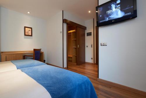 Habitación Familiar del hotel 40 Nudos. Foto 3