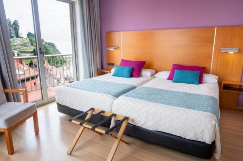 Habitación Superior con vistas a la ciudad - 2 camas individuales del hotel Faranda Marsol Candás