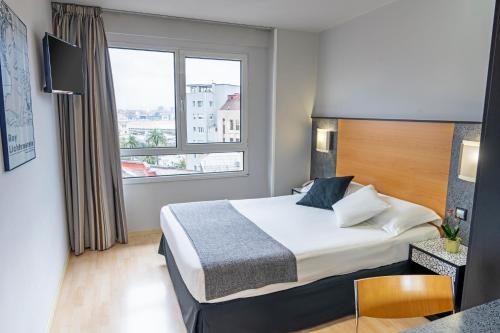 1 cama doble del hotel Faranda Pathos Gijon, Ascend Hotel Collection