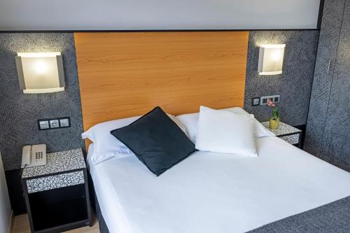 1 cama doble del hotel Faranda Pathos Gijon, Ascend Hotel Collection. Foto 1