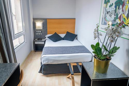 1 cama individual del hotel Faranda Pathos Gijon, Ascend Hotel Collection