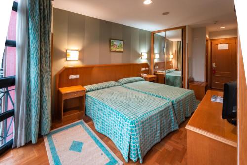 Habitación Doble con cama supletoria - 1 o 2 camas del hotel Astures
