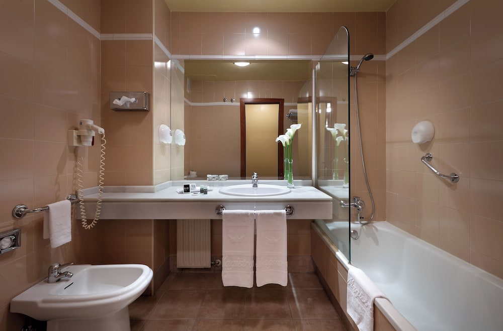 Habitación triple del hotel Exe El Magistral