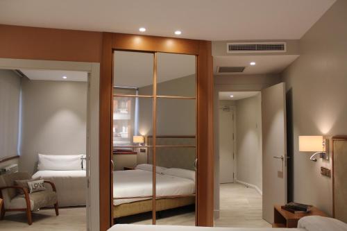 Habitación Familiar del hotel Carreño. Foto 13
