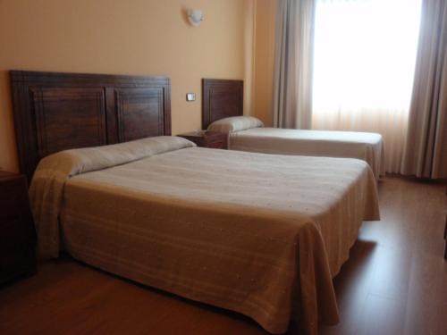 Habitación Doble con cama supletoria - 1 o 2 camas del hotel Piedra. Foto 1