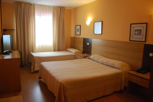 Habitación Doble con cama supletoria - 1 o 2 camas del hotel Piedra. Foto 2