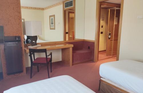 Habitación Triple del hotel Sercotel Cuatro Postes