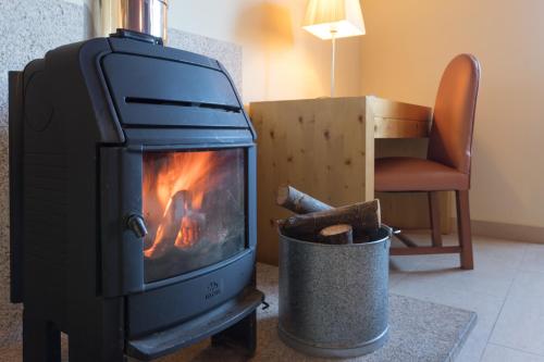 Habitación Dúplex con chimenea del hotel Izan Puerta de Gredos. Foto 5