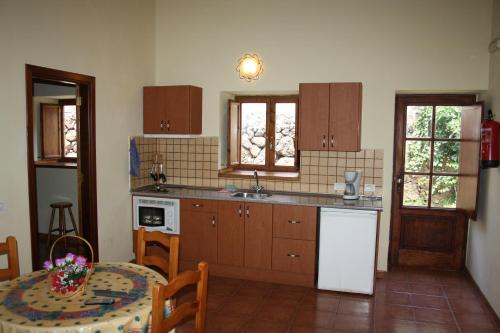 Casa Vista Piscina Vista Jardin 1 habitación Sofá Cama incluido 2 Camas individuales del hotel Finca El Vergel Rural. Foto 9