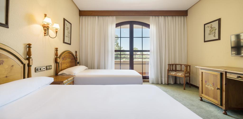 Habitación doble 2 camas del hotel Ilunion Golf Badajoz
