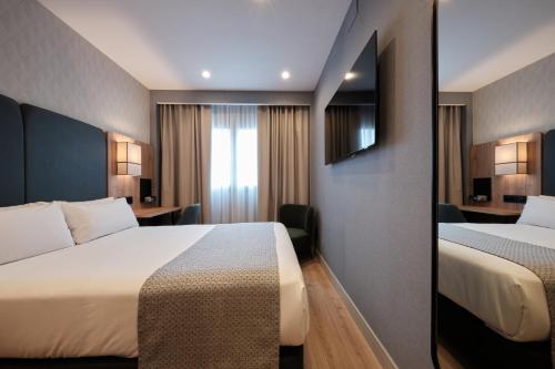 Habitación Individual Deluxe del hotel Catalonia La Maquinista. Foto 3