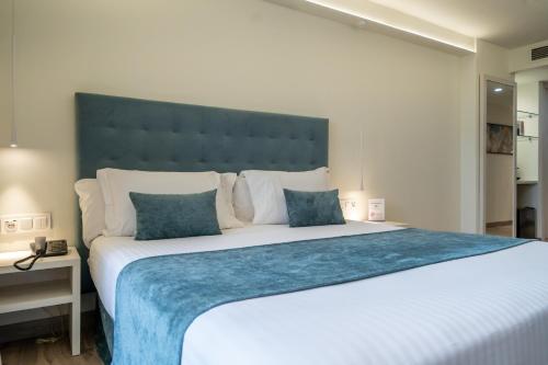 Habitación Doble Deluxe - 2 camas del hotel Concordia Barcelona. Foto 1