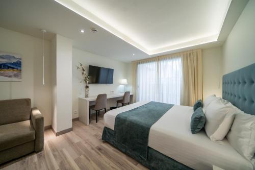 Habitación Doble Deluxe - 2 camas del hotel Concordia Barcelona. Foto 5