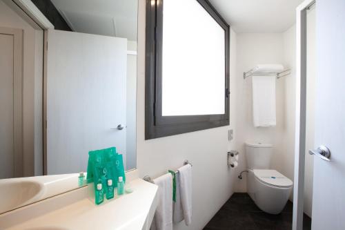 Habitación Doble Básica del hotel Concordia Barcelona. Foto 1