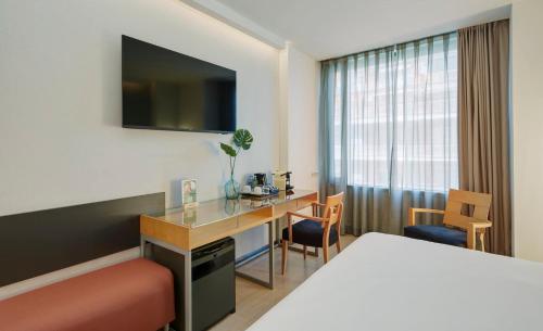 Habitación Doble Superior del hotel Sercotel Caspe. Foto 1