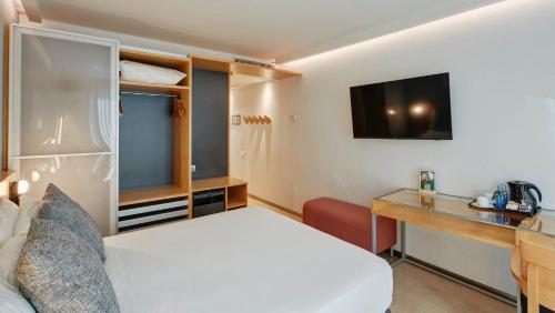 Habitación Estándar - 1 cama grande del hotel Sercotel Caspe. Foto 3