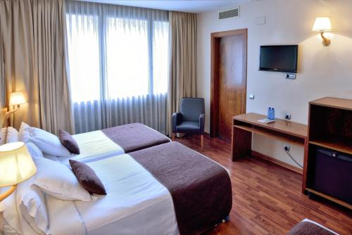 Habitación Triple del hotel ITC Barcelona by Soho Boutique. Foto 4