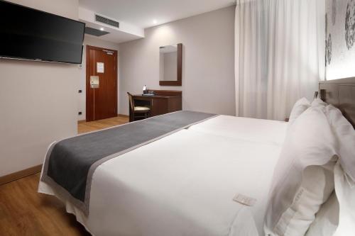 Habitación Doble - 2 camas del hotel Hcc Taber. Foto 3