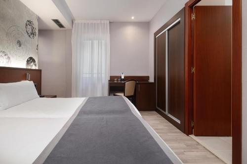 Habitación Doble - 2 camas del hotel Hcc Taber. Foto 6