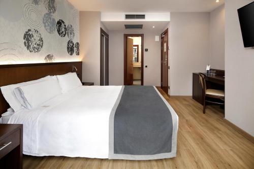 Habitación Doble - 2 camas del hotel Hcc Taber. Foto 8