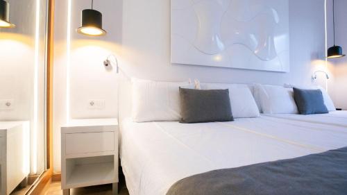 Habitación Triple del hotel Evenia Rocafort. Foto 5