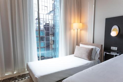 Habitación Triple del hotel Eurostars Cristal Palace. Foto 4