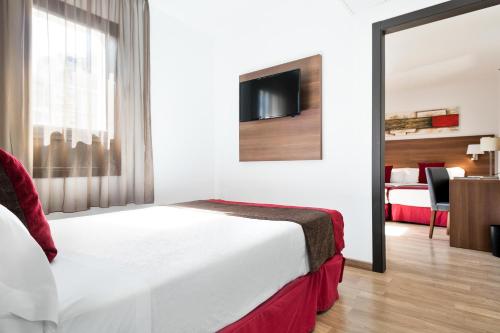 Habitación Triple del hotel Best Auto Hogar. Foto 1