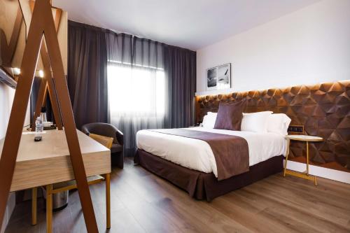 Habitación Standard con 1 cama extragrande y litera - No fumadores del hotel Best Western Plus Hotel Alfa Aeropuerto. Foto 5