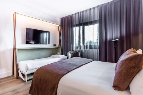 Habitación Triple Estándar con 1 cama doble y 1 cama individual - No fumadores del hotel Best Western Plus Hotel Alfa Aeropuerto