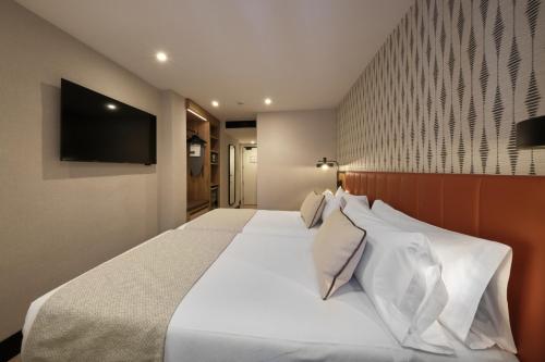 Habitación Doble Superior del hotel Catalonia Park Putxet. Foto 7