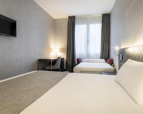 Habitación Triple del hotel Ilunion Bel Art. Foto 4