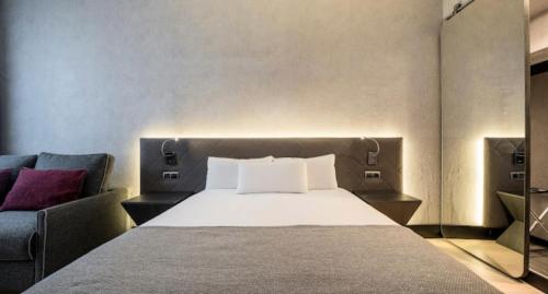 Habitación Triple del hotel Ilunion Bel Art. Foto 5