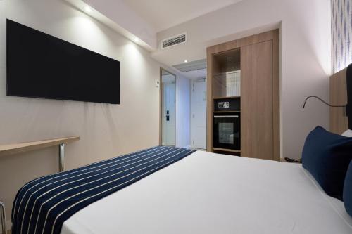 Habitación Individual del hotel Catalonia Roma. Foto 2