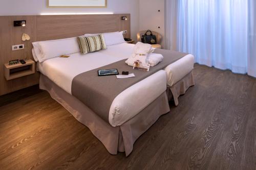 Habitación Doble Deluxe con vistas a la Rambla - 1 o 2 camas del hotel Serhs Rivoli Rambla. Foto 1