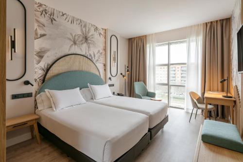 Habitación Vincci con cama supletoria del hotel Vincci Maritimo