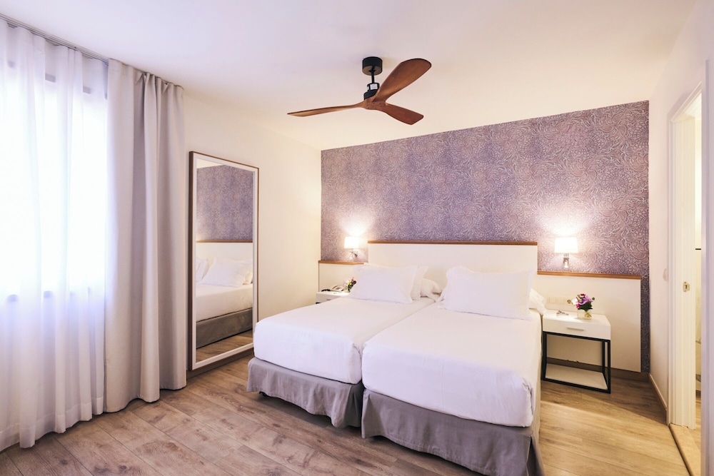 Habitación Classic del hotel H10 Racó del Pi Boutique Hotel. Foto 3