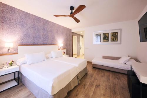 Habitación Superior Attic del hotel H10 Racó del Pi Boutique Hotel. Foto 3